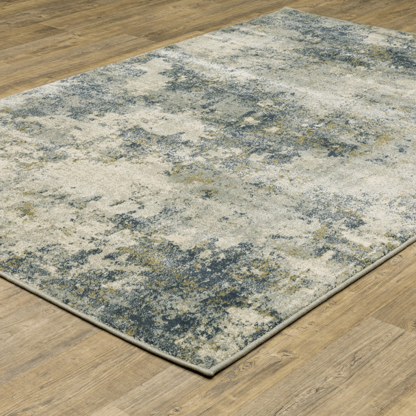 8' X 10' Beige Teal Grey And Gold Abstract Power Loom Stain Resistant Area Rug
