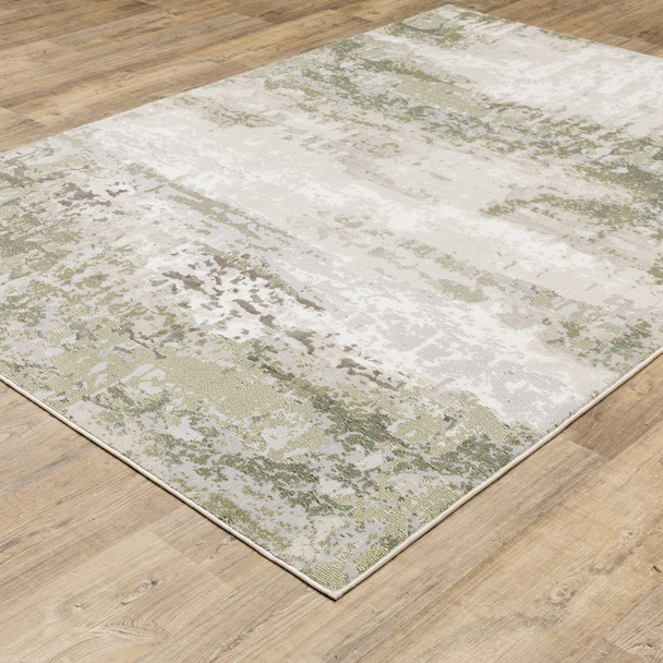 5' X 8' Beige Grey Brown And Sage Green Abstract Power Loom Stain Resistant Area Rug