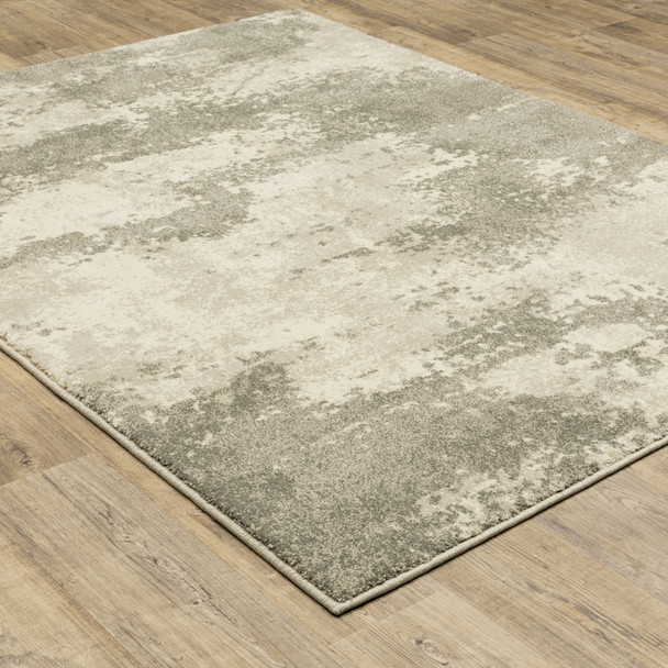 10' X 13' Beige And Grey Abstract Power Loom Stain Resistant Area Rug