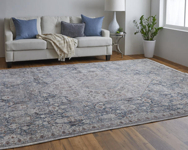 10' X 13' Blue And Ivory Floral Power Loom Stain Resistant Area Rug