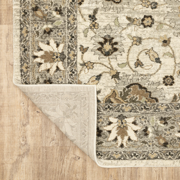 5' X 8' Beige Grey Brown And Charcoal Oriental Power Loom Stain Resistant Area Rug