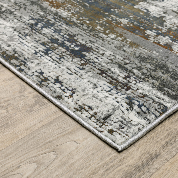 6' X 9' Ivory Charcoal Grey Blue Rust And Brown Abstract Power Loom Stain Resistant Area Rug