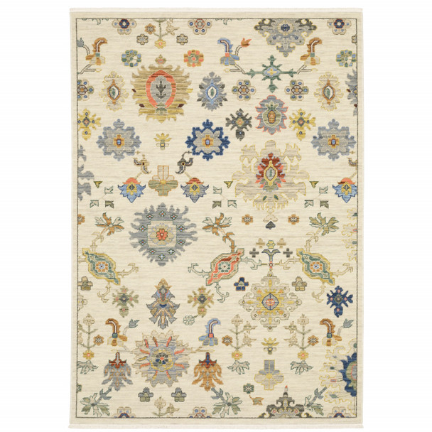 10' X 13' Ivory Beige Gold Grey Blue Pink Red Rust And Green Oriental Power Loom Stain Resistant Area Rug With Fringe