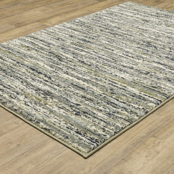 10' X 13' Blue Green Light Blue Grey And Ivory Abstract Power Loom Stain Resistant Area Rug