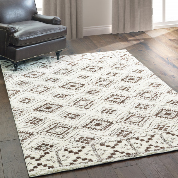 10' X 13' Ivory And Brown Geometric Shag Power Loom Stain Resistant Area Rug