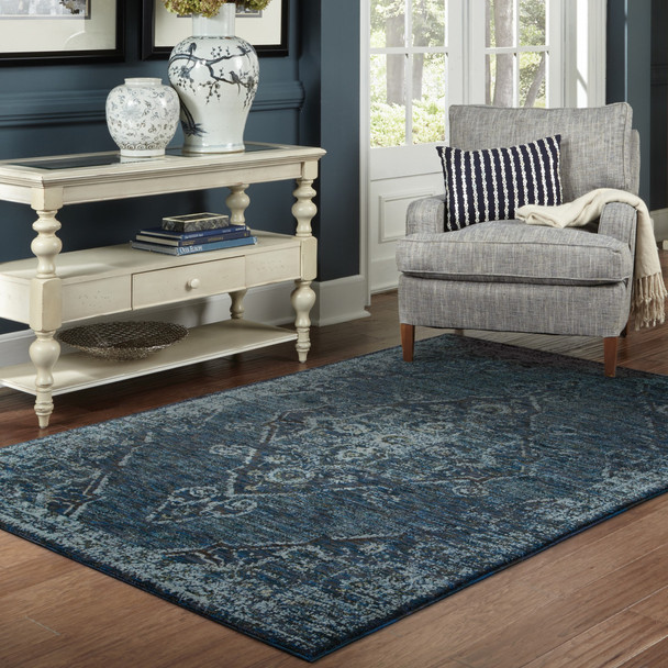 5' X 7' Blue And Brown Oriental Power Loom Stain Resistant Area Rug