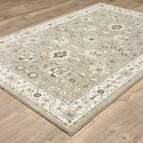 9' X 12' Beige Ivory Blue Green And Purple Oriental Power Loom Stain Resistant Area Rug