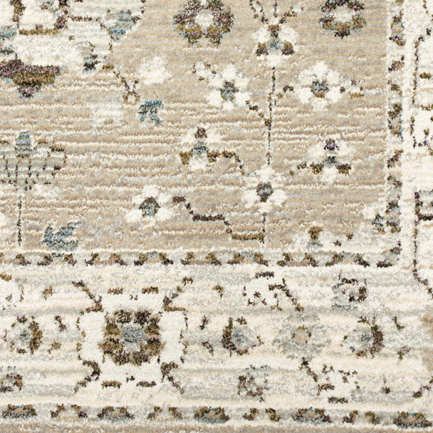 9' X 12' Beige Ivory Blue Green And Purple Oriental Power Loom Stain Resistant Area Rug