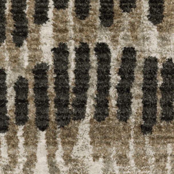 8' X 11' Beige Ivory Charcoal Brown Tan And Grey Abstract Power Loom Stain Resistant Area Rug With Fringe