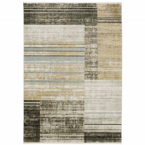 5' X 8' Beige Charcoal Brown Grey Tan Gold And Blue Geometric Power Loom Stain Resistant Area Rug With Fringe