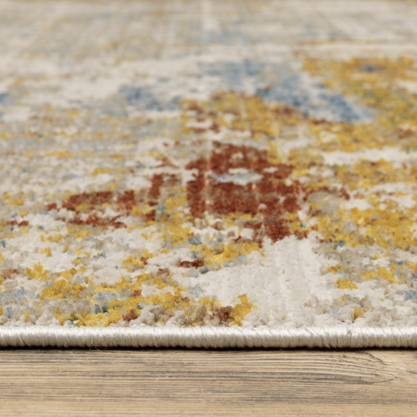 5' X 8' Beige Grey Gold Blue Rust And Teal Abstract Power Loom Stain Resistant Area Rug With Fringe