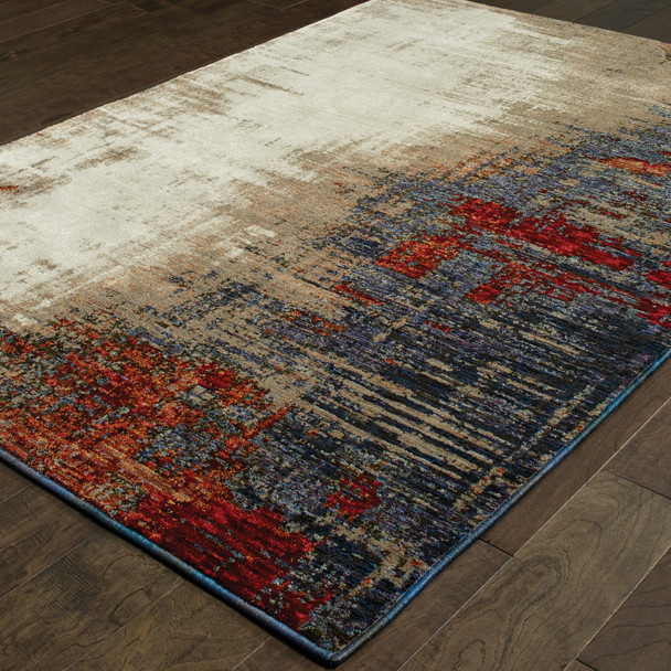 3' X 5' Beige Tan Brown Blue Purple Red Orange Gold And Green Abstract Power Loom Stain Resistant Area Rug