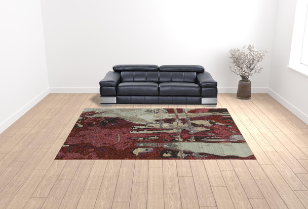 10' X 13' Red And Beige Abstract Power Loom Stain Resistant Area Rug