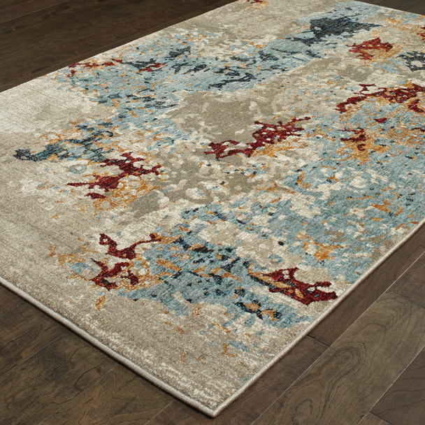 10' X 13' Beige And Blue Abstract Power Loom Stain Resistant Area Rug