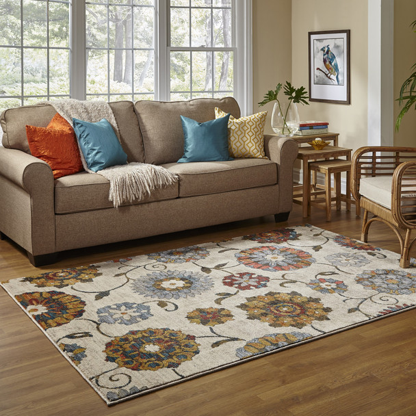 4' X 6' Ivory Blue Gold Green Orange Rust And Teal Floral Power Loom Stain Resistant Area Rug