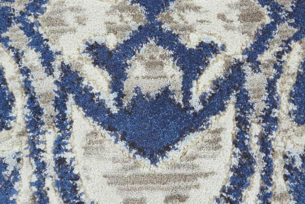 '9' Blue Taupe And Ivory Round Ikat Distressed Stain Resistant Area Rug