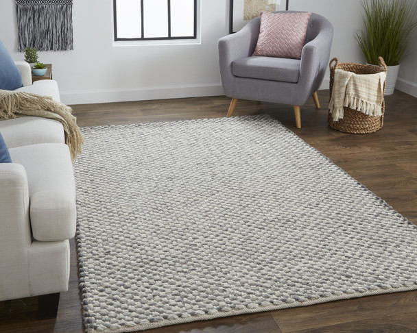 8' X 11' Gray And Ivory Wool Floral Hand Woven Stain Resistant Area Rug