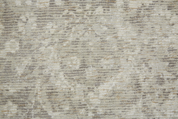 5' X 8' Ivory And Tan Abstract Hand Woven Area Rug