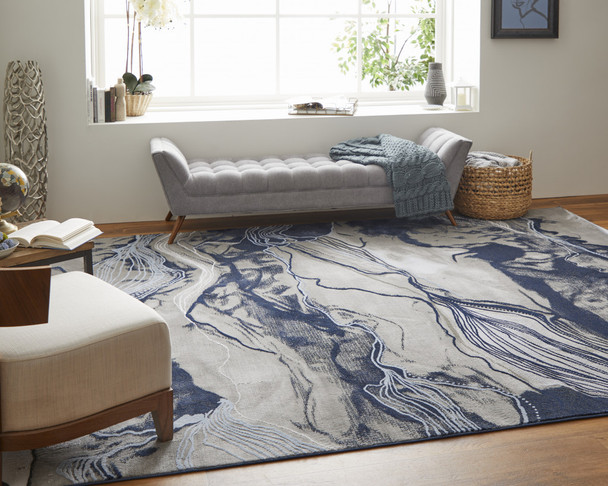 8' X 11' Blue Gray And Ivory Abstract Power Loom Stain Resistant Area Rug