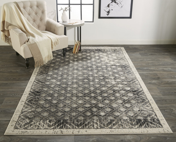10' X 14' Ivory Black And Taupe Abstract Stain Resistant Area Rug