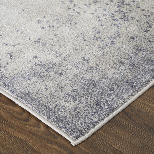 9' X 12' Ivory And Blue Abstract Power Loom Area Rug