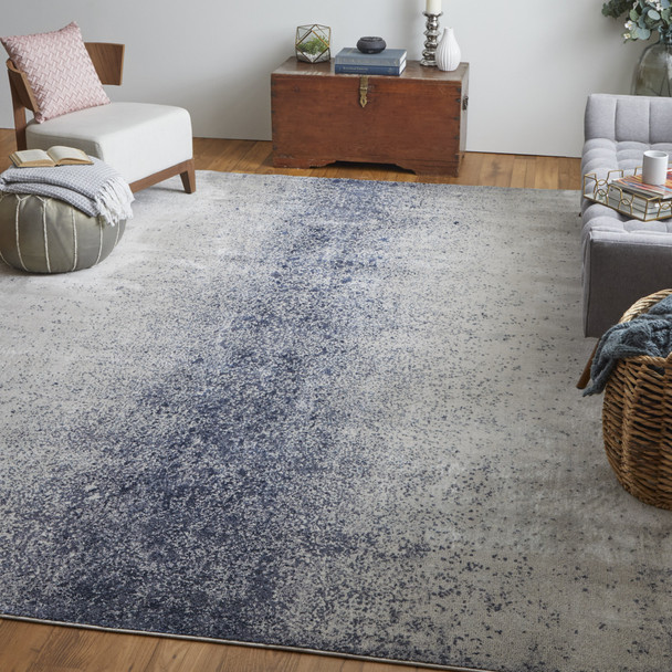12' X 15' Ivory And Blue Abstract Power Loom Area Rug