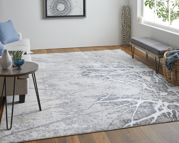 9' X 12' Gray Silver And Ivory Abstract Power Loom Area Rug