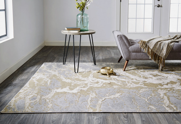 10' X 13' Ivory Silver And Gold Abstract Stain Resistant Area Rug