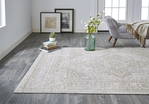 5' X 8' Ivory And Gold Floral Stain Resistant Area Rug