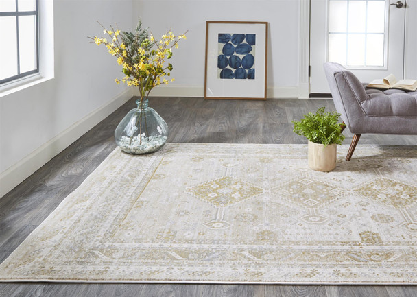 5' X 8' Gold And Ivory Floral Stain Resistant Area Rug