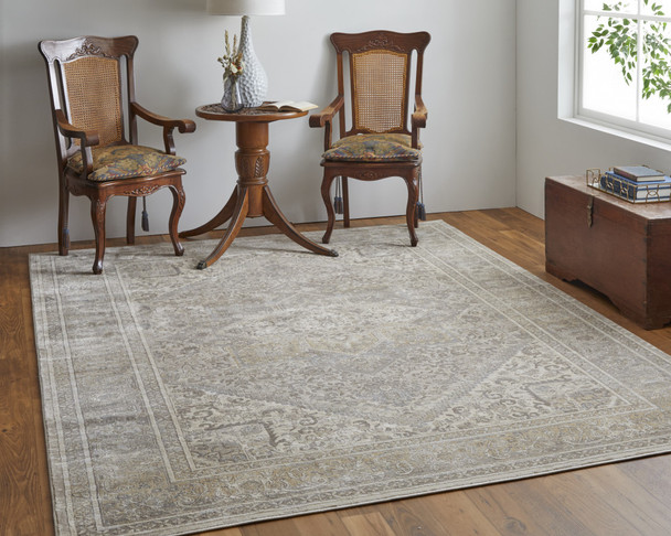 8' X 10' Tan Brown And Ivory Floral Power Loom Distressed Area Rug