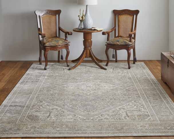 8' X 10' Tan Brown And Ivory Floral Power Loom Distressed Area Rug