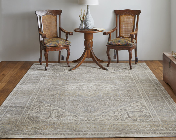 9' X 12' Tan Brown And Ivory Floral Power Loom Distressed Area Rug