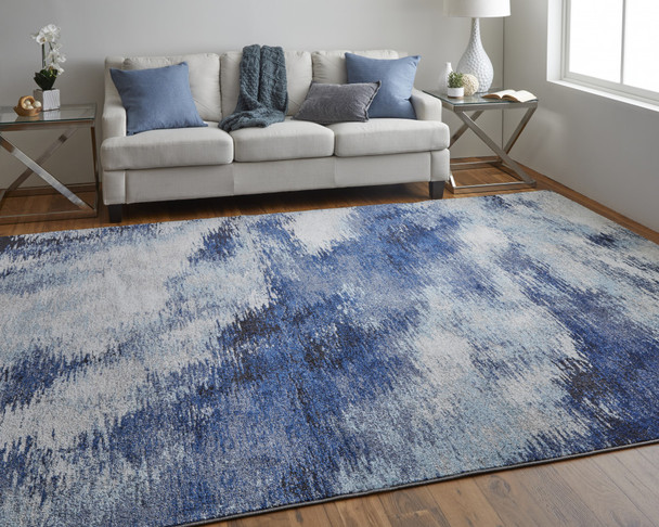 9' X 12' Blue And Ivory Abstract Power Loom Stain Resistant Area Rug
