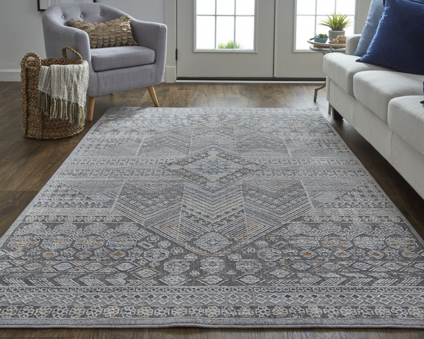 9' X 12' Ivory And Gray Geometric Power Loom Distressed Stain Resistant Area Rug