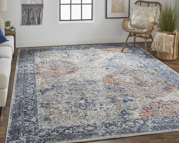 9' X 12' Blue Ivory And Red Floral Power Loom Distressed Stain Resistant Area Rug