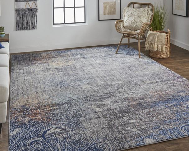 9' X 12' Taupe Blue And Ivory Abstract Power Loom Distressed Stain Resistant Area Rug