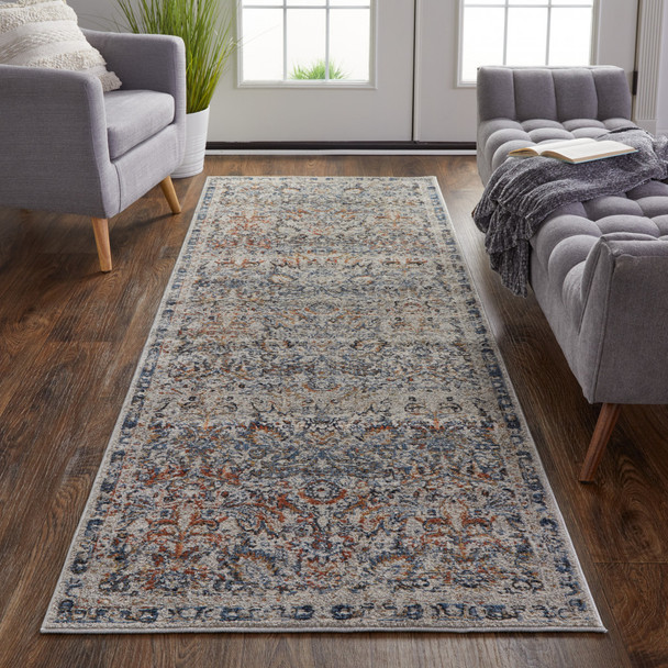 12' Tan Blue And Orange Floral Power Loom Distressed Runner Rug With Fringe