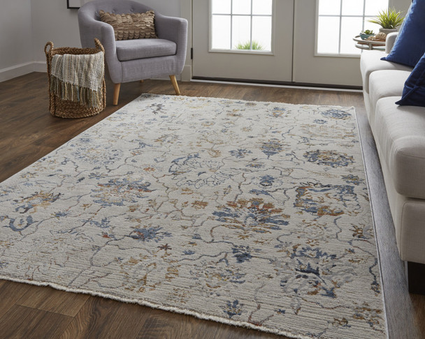 10' X 13' Ivory Orange And Blue Floral Power Loom Distressed Area Rug With Fringe