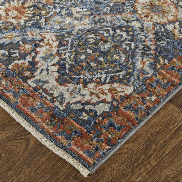 10' X 13' Blue Orange And Ivory Floral Power Loom Area Rug With Fringe