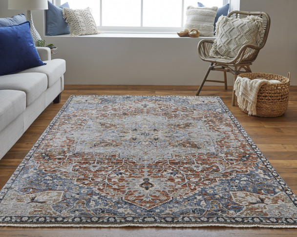10' X 13' Orange Ivory And Blue Floral Power Loom Area Rug With Fringe