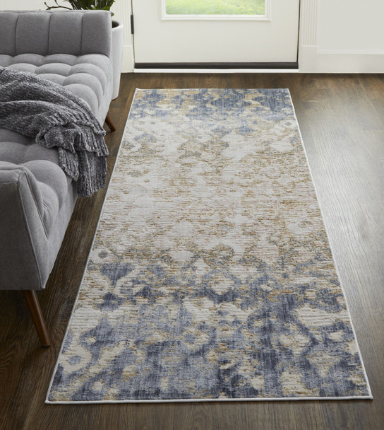 10' Tan Ivory And Blue Abstract Power Loom Distressed Runner Rug