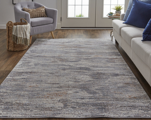 10' X 13' Taupe Tan And Orange Abstract Power Loom Distressed Stain Resistant Area Rug