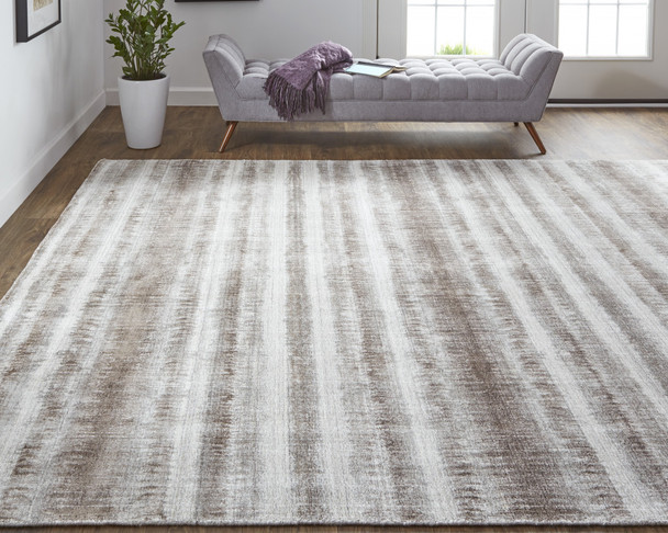 8' X 10' Tan Ivory And Brown Abstract Hand Woven Area Rug