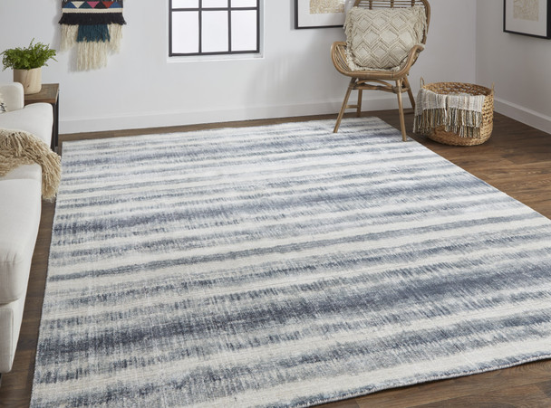 4' X 6' Ivory And Blue Abstract Hand Woven Area Rug