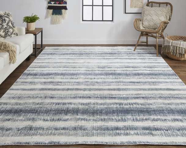 9' X 12' Ivory And Blue Abstract Hand Woven Area Rug