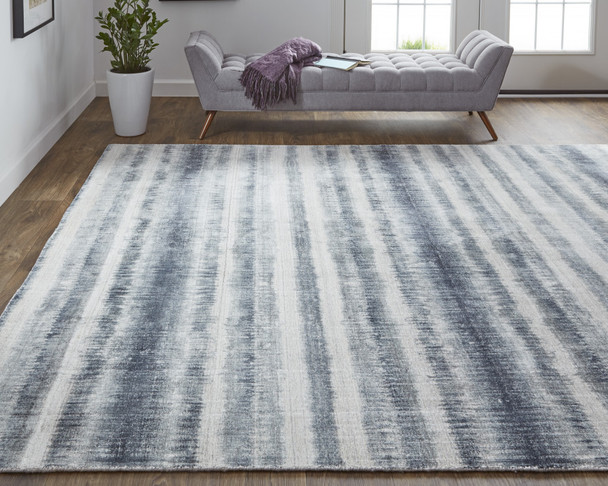 9' X 12' Ivory And Blue Abstract Hand Woven Area Rug