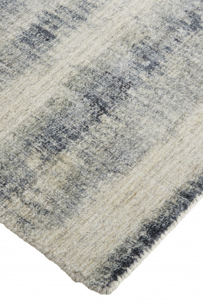 9' X 12' Ivory And Blue Abstract Hand Woven Area Rug