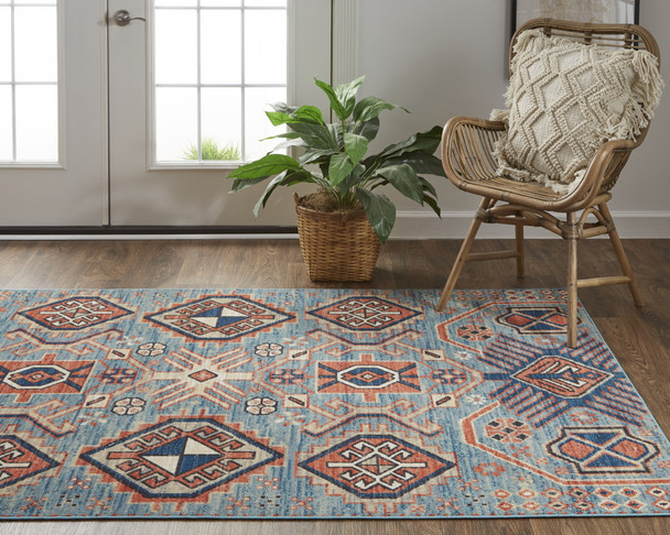 10' X 13' Blue Red And Tan Abstract Power Loom Distressed Stain Resistant Area Rug