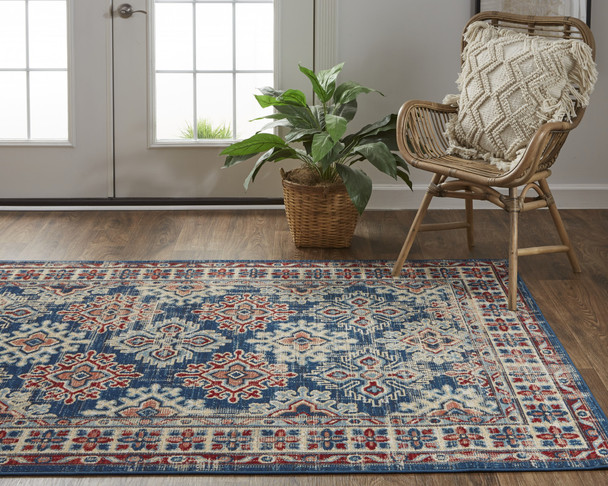 8' X 11' Blue Red And Ivory Abstract Power Loom Distressed Stain Resistant Area Rug